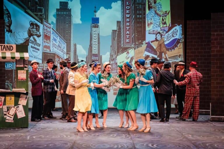 Balcony scene from a musical at Oshawa Little Theatre with performers in vintage costumes.